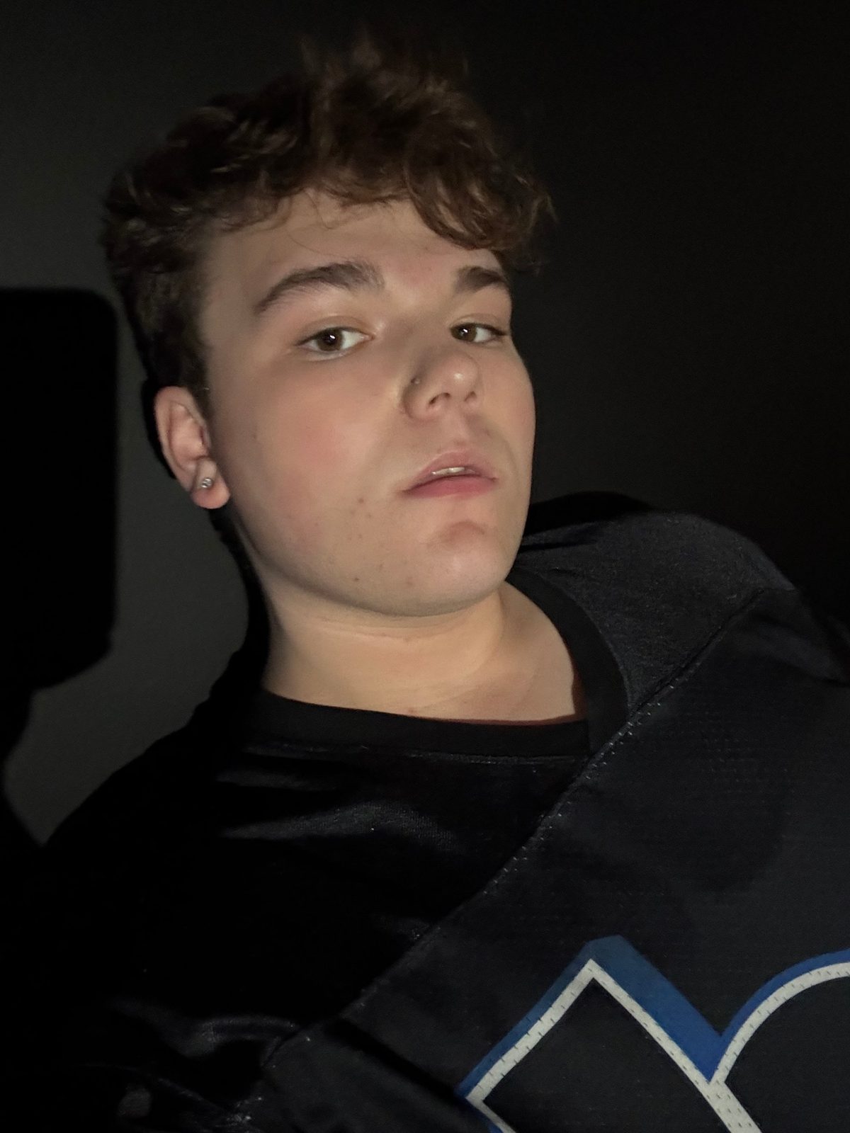 Nathan Etes in a dark room